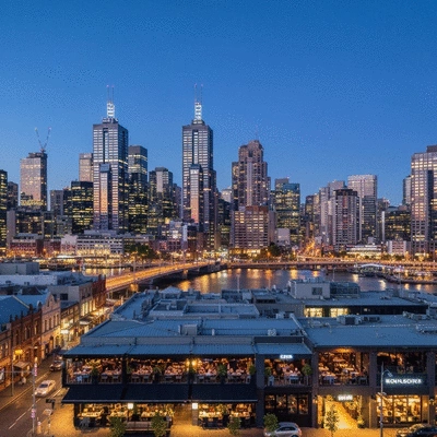 Melbourne skyline at dusk with vibrant restaurant lights