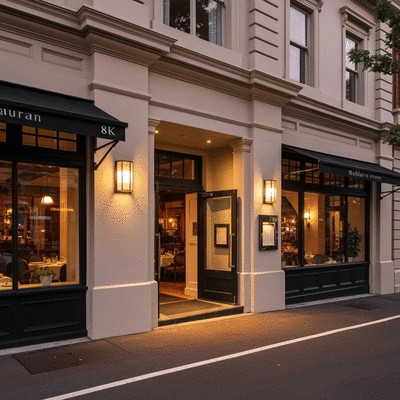 Stylish restaurant exterior in Melbourne at dusk, warm lighting, inviting atmosphere, no text, no words, no typography, 8K, natural lighting